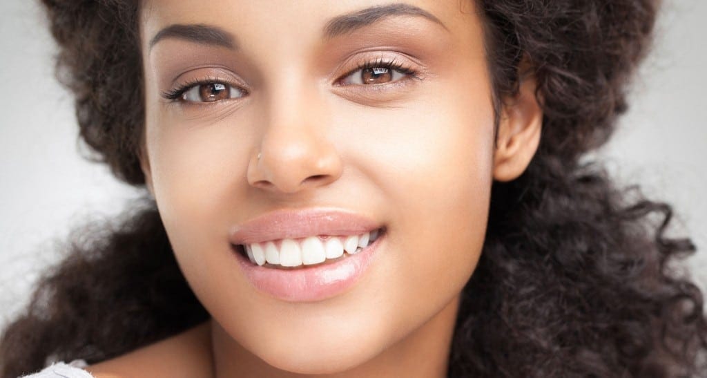 Girl smiling with white teeth 